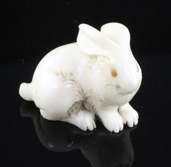 A Japanese ivory netsuke of a hare, Meiji period, 4cm